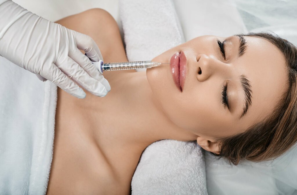 Young Female Getting Lip-filler Treatment | Soul Aesthetics in Tulsa, OK