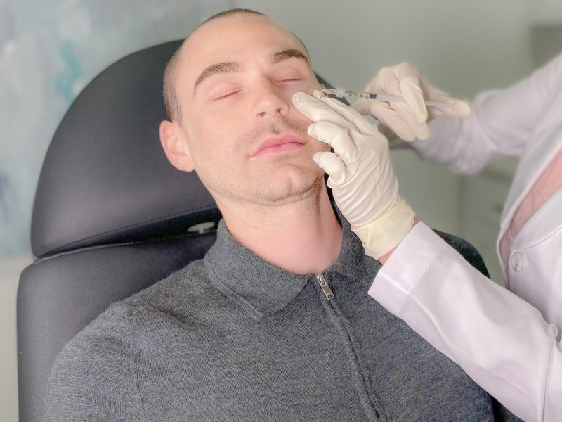 Beautician doing PRP therapy for the face against wrinkles of a man in beauty salon | Soul Aesthetics in Tulsa, OK