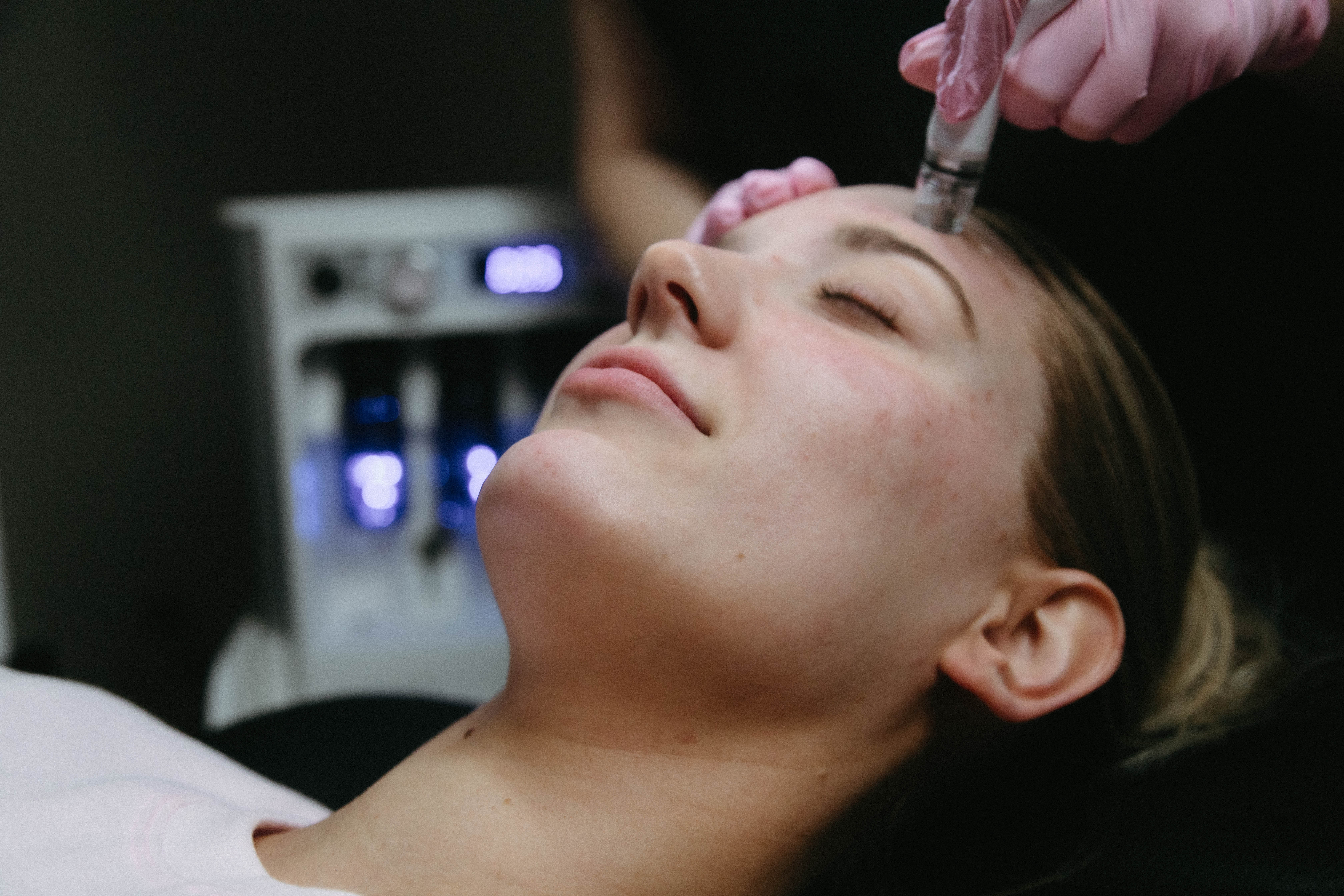 Photo of a woman receiving a facial treatment at Soul Aesthetics.
