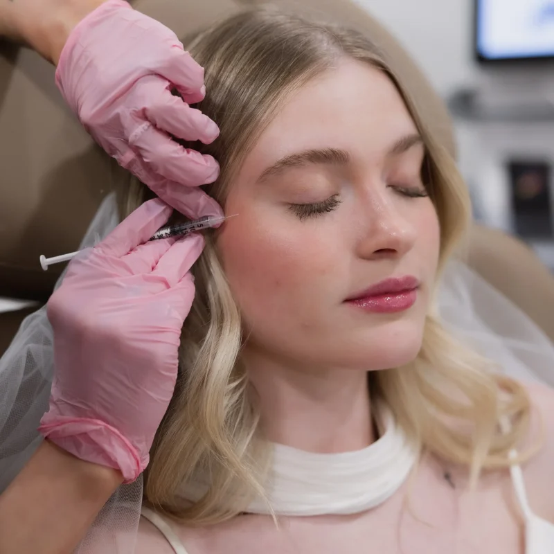 Woman in bridal dress recieving a Soul Bridal Package